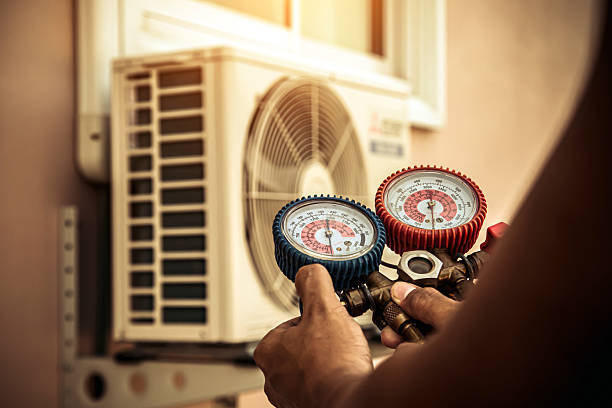 Professional Hvac Maintenance technician working in Bryantville, MA